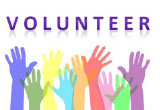 A graphic of hands being raised in the air toward the word, 'VOLUNTEER'